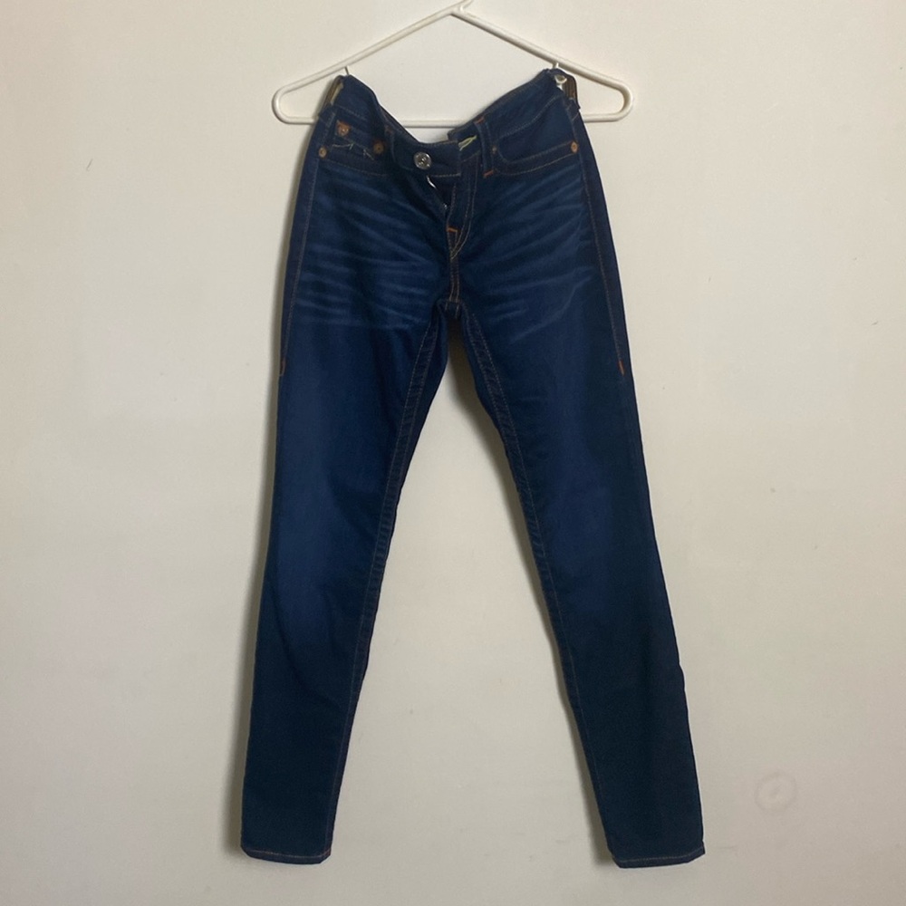 Up for sale is a pair of deep blue true teligion jeans with a legging fit.